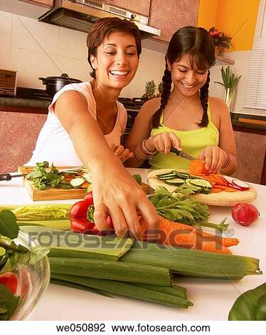 MOTHER AND SON IN KITCHEN. MOTHER IN KITCHEN. MOTHER AND SON COOKING. MOTHER COOKING. View Large Photo Image Stock Image - MOTHER AND SON IN KITCHEN. MOTHER IN KITCHEN. MOTHER AND SON COOKING. MOTHER COOKING.. Fotosearch
