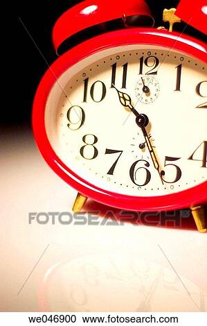 Old-fashioned red alarm clock. View Large Photo Image Stock Image - Old-fashioned red alarm clock.. Fotosearch
