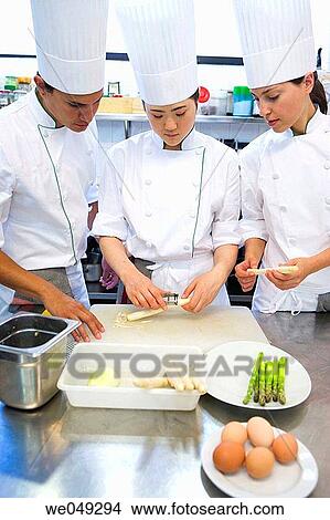 Peeling asparagus. Luis Irizar cooking school. Donostia, Gipuzkoa, Basque Country, Spain View Large Photo Image Picture - Peeling asparagus. Luis Irizar cooking school. Donostia, Gipuzkoa, Basque Country, Spain. Fotosearch