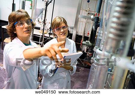 Stock Image - Polytechnic School, University of the Basque Country, Donostia, Gipuzkoa, Basque Country. Students, Distillation towers, Laboratory of Industrial Chemistry, Department of Chemical Engineering and Environment. Fotosearch