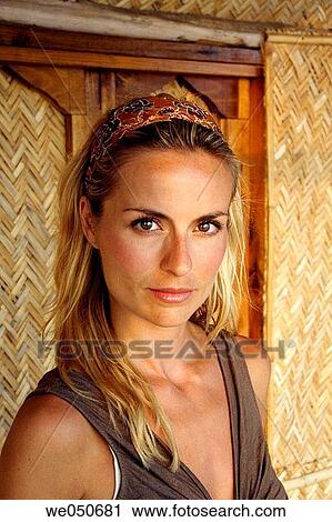Portrait of beautiful blonde woman shot in an Indian beach hut. View Large Photo Image Stock Image - Portrait of beautiful blonde woman shot in an Indian beach hut.. Fotosearch