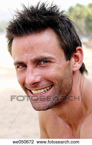 Portrait of caucasian man smiling at camera. View Large Photo Image Stock Image - Portrait of caucasian man smiling at camera.. Fotosearch