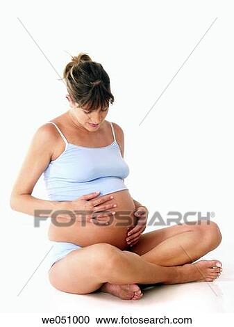 Pregnant woman in white background View Large Photo Image Stock Image - Pregnant woman in white background. Fotosearch