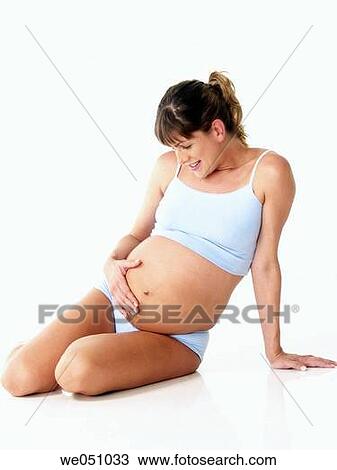 Pregnant woman in white background View Large Photo Image Stock Image - Pregnant woman in white background. Fotosearch