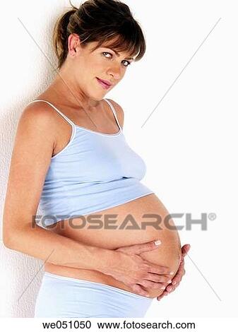 Pregnant woman in white background View Large Photo Image Stock Image - Pregnant woman in white background. Fotosearch