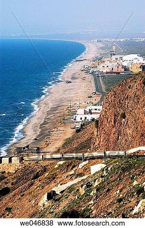 Road leading to the beach of San Miguel de Cabo de Gata. Andalusia. Spain View Large Photo Image Stock Photo - Road leading to the beach of San Miguel de Cabo de Gata. Andalusia. Spain. Fotosearch