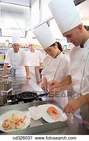 Sauteing prawns y salmon. Luis Irizar cooking school. Donostia, Gipuzkoa, Basque Country, Spain View Large Photo Image Stock Photo - Sauteing prawns y salmon. Luis Irizar cooking school. Donostia, Gipuzkoa, Basque Country, Spain. Fotosearch