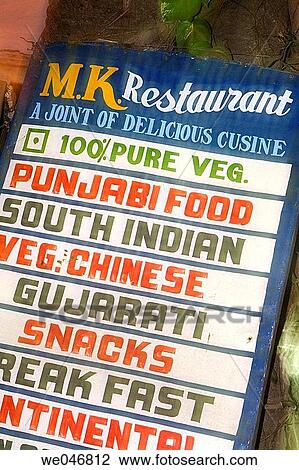 Stock Image - Sign for varied Indian cuisine. Mt Abu. Rajasthan. India.. Fotosearch