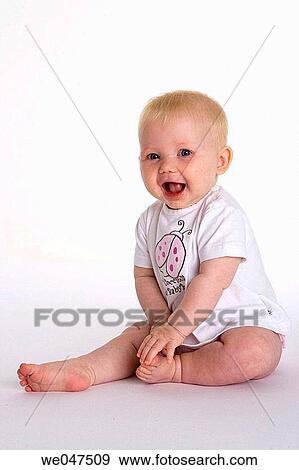 Stock Photo - Sitting baby. Fotosearch