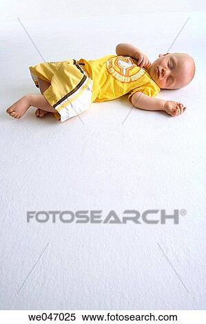 Sleeping baby View Large Photo Image Stock Photography - Sleeping baby. Fotosearch