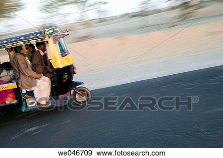 Speeding rickshaw. Bikaner. Rajasthan. India. View Large Photo Image Stock Photo - Speeding rickshaw. Bikaner. Rajasthan. India.. Fotosearch