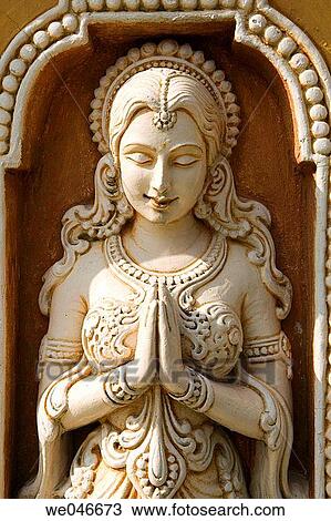 Stock Image - Statue of praying princess. Rishikesh. Uttaranchal. India.. Fotosearch
