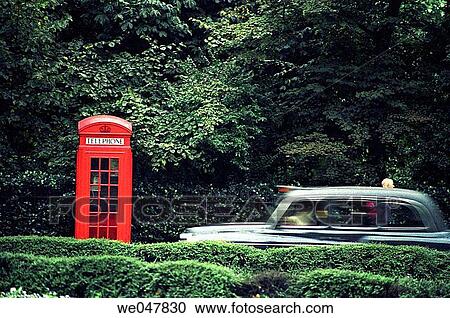 Street scene in London, telephone booth, man and moving car. UK. View Large Photo Image Stock Image - Street scene in London, telephone booth, man and moving car. UK.. Fotosearch