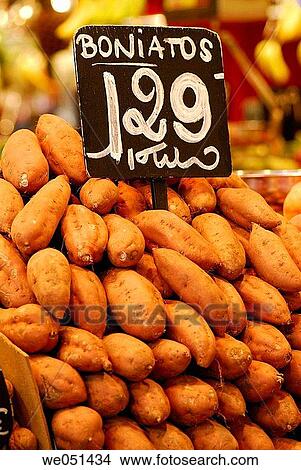 Picture - Sweet potatoes at La Boqueria market, Barcelona. Catalonia, Spain. Fotosearch