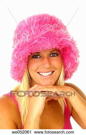 Teen smiling with pink hat View Large Photo Image Stock Image - Teen smiling with pink hat. Fotosearch