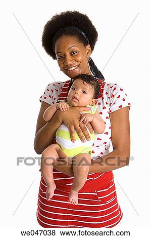 Teenage mother and baby View Large Photo Image Stock Photo - Teenage mother and baby. Fotosearch