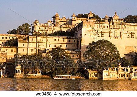 Tour boat on Lake Pichola in front of the City Palace. Udaipur. Rajasthan. India. View Large Photo Image Picture - Tour boat on Lake Pichola in front of the City Palace. Udaipur. Rajasthan. India.. Fotosearch