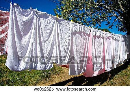 Stock Photography - Towels drying in a clothes line. France. Fotosearch
