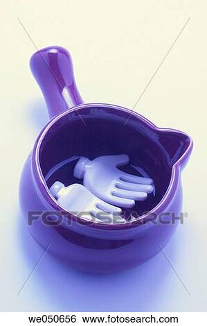 Toy Hands in Sauce Pot View Large Photo Image Stock Photograph - Toy Hands in Sauce Pot. Fotosearch