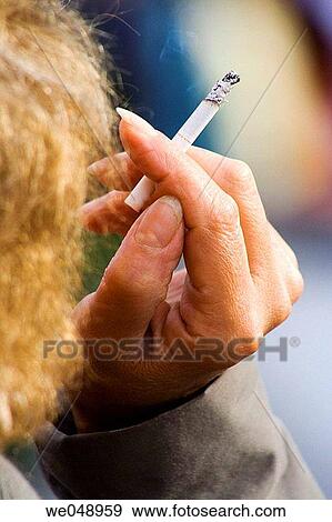 Woman is smoking in France View Large Photo Image Stock Photo - Woman is smoking in France. Fotosearch