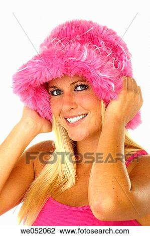 Woman smiling with pink hat View Large Photo Image Stock Image - Woman smiling with pink hat. Fotosearch