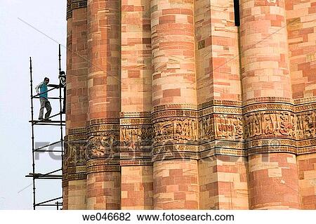 Workers restauring the Qutb Minar (Unesco World Heritage Site). New Delhi, India. View Large Photo Image Stock Image - Workers restauring the Qutb Minar (Unesco World Heritage Site). New Delhi, India.. Fotosearch