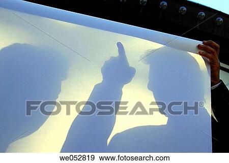 2 young male business men/ architects looking at building plans together View Large Photo Image Stock Photo - 2 young male business men/ architects looking at building plans together. Fotosearch