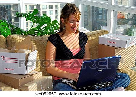 20 yr woman home shopping on laptop computer View Large Photo Image Stock Image - 20 yr woman home shopping on laptop computer. Fotosearch
