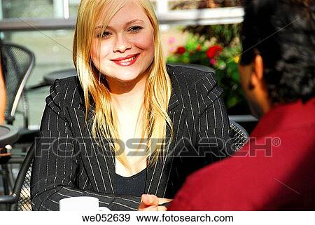 25 yr old caucasian business woman having coffee with ethnic 35 yr old business man View Large Photo Image Stock Photo - 25 yr old caucasian business woman having coffee with ethnic 35 yr old business man. Fotosearch