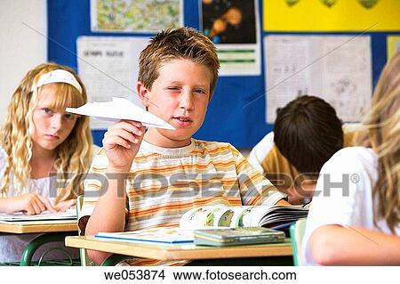Picture - absent-mindedness, boy, book, airplane, Absent-minded. Fotosearch