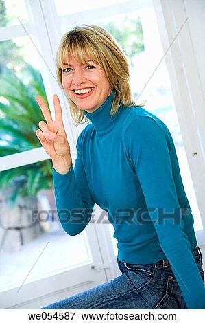 achievement, blond, at-home, 30's View Large Photo Image Stock Photo - achievement, blond, at-home, 30's. Fotosearch