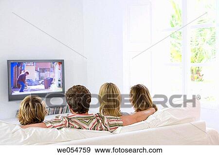 Stock Photo - addiction, back view, at-home, 30's. Fotosearch