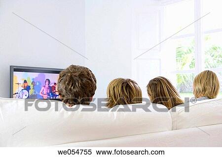 Stock Photography - addiction, back view, at-home, 30's. Fotosearch