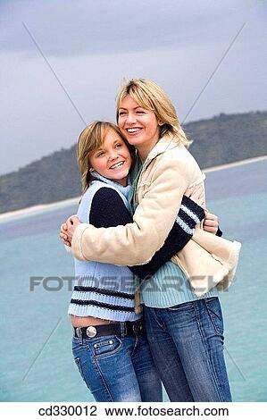 affection, beach, autumn, amusement, 30's View Large Photo Image Stock Image - affection, beach, autumn, amusement, 30's. Fotosearch