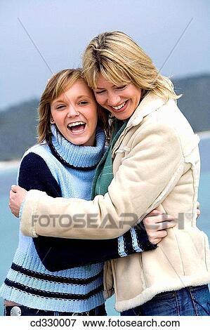 affection, beach, autumn, amusement, 30's View Large Photo Image Stock Photo - affection, beach, autumn, amusement, 30's. Fotosearch