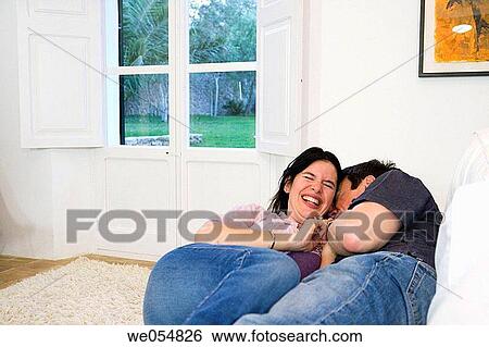 affection, black hair, at-home, amusement, 30's View Large Photo Image Stock Photograph - affection, black hair, at-home, amusement, 30's. Fotosearch