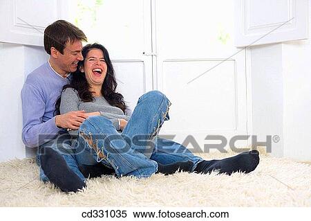 affection, black hair, at-home, amusement, 30's View Large Photo Image Stock Photography - affection, black hair, at-home, amusement, 30's. Fotosearch