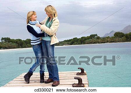 affection, bond, beach, autumn, 30's View Large Photo Image Stock Image - affection, bond, beach, autumn, 30's. Fotosearch