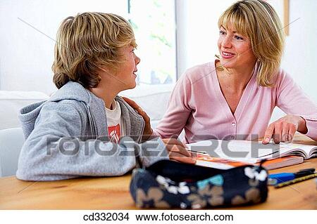 Picture - aid, boy, book, at-home, 30's. Fotosearch