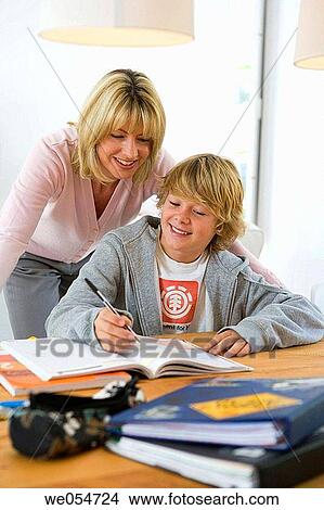 aid, boy, book, at-home, 30's View Large Photo Image Picture - aid, boy, book, at-home, 30's. Fotosearch
