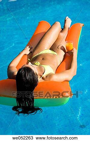 air-bed, beauty, bathing-suit, air mattress View Large Photo Image Stock Image - air-bed, beauty, bathing-suit, air mattress. Fotosearch
