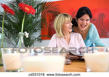 amusement, browsing, browse, at-home, 30's View Large Photo Image Stock Photo - amusement, browsing, browse, at-home, 30's. Fotosearch