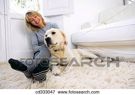 animal, calm, barefoot, at-home, 30's View Large Photo Image Stock Photo - animal, calm, barefoot, at-home, 30's. Fotosearch