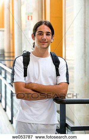 Arms crossed, boy, black hair, arms folded, adolescence View Large Photo Image Stock Photo - Arms crossed, boy, black hair, arms folded, adolescence. Fotosearch