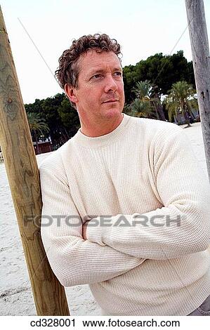 Arms crossed, contemporary, absorbed View Large Photo Image Stock Image - Arms crossed, contemporary, absorbed. Fotosearch