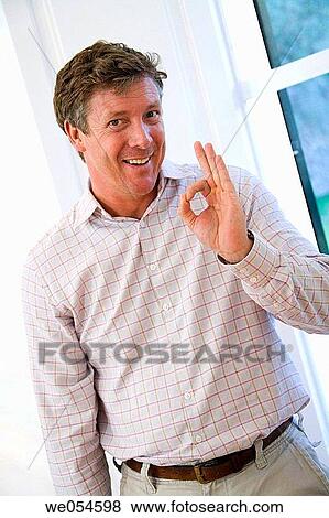 Stock Photo - at-home, baby boomer, approval. Fotosearch