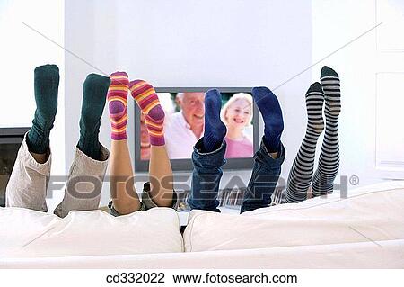 Stock Image - at-home, boy, barefoot, amusing. Fotosearch