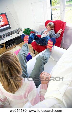 at-home, brother, boy, barefoot, amusement View Large Photo Image Stock Image - at-home, brother, boy, barefoot, amusement. Fotosearch