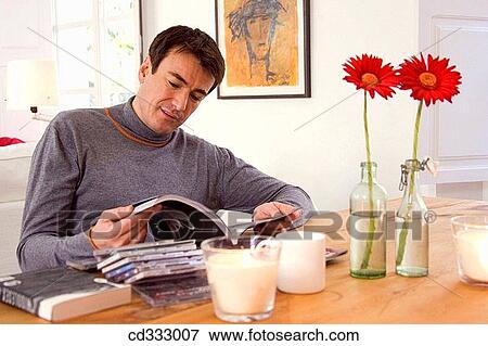 at-home, browse, book, 30's View Large Photo Image Stock Photo - at-home, browse, book, 30's. Fotosearch