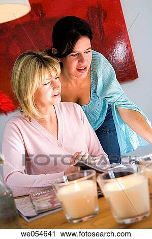 at-home, candle, browsing, browse, 30's View Large Photo Image Stock Image - at-home, candle, browsing, browse, 30's. Fotosearch